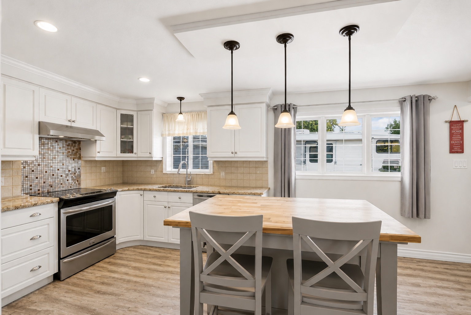Kitchen with island and granite counters