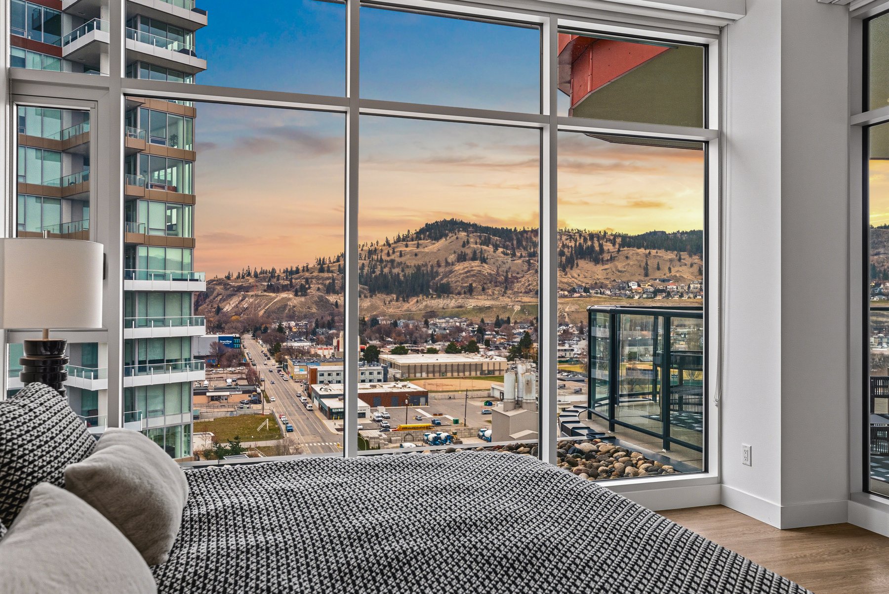 View of Knox Mountain from the primary bedroom — the trail head is minutes from the lobby