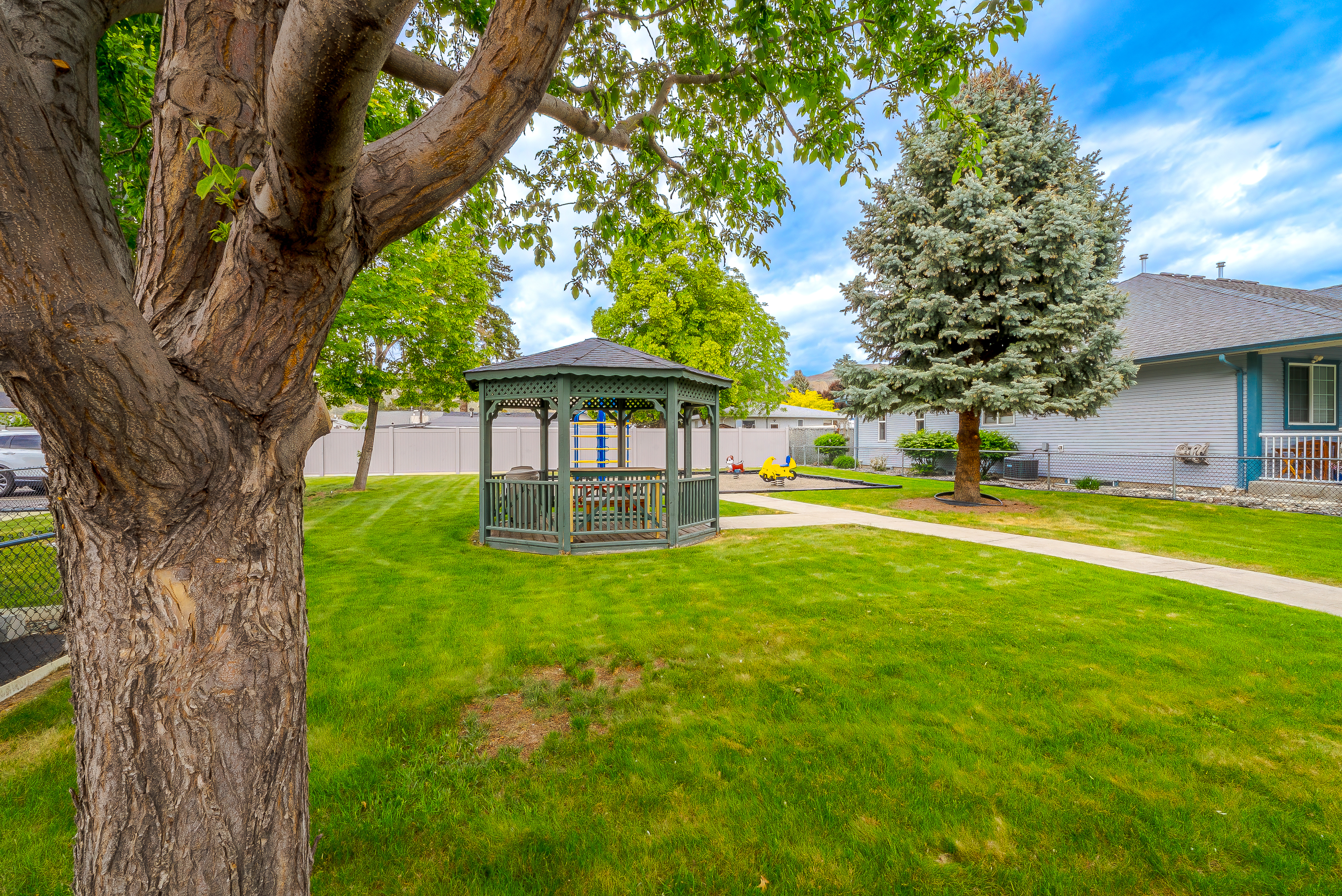 Kids park and outdoor green space within the Riverstone complex
