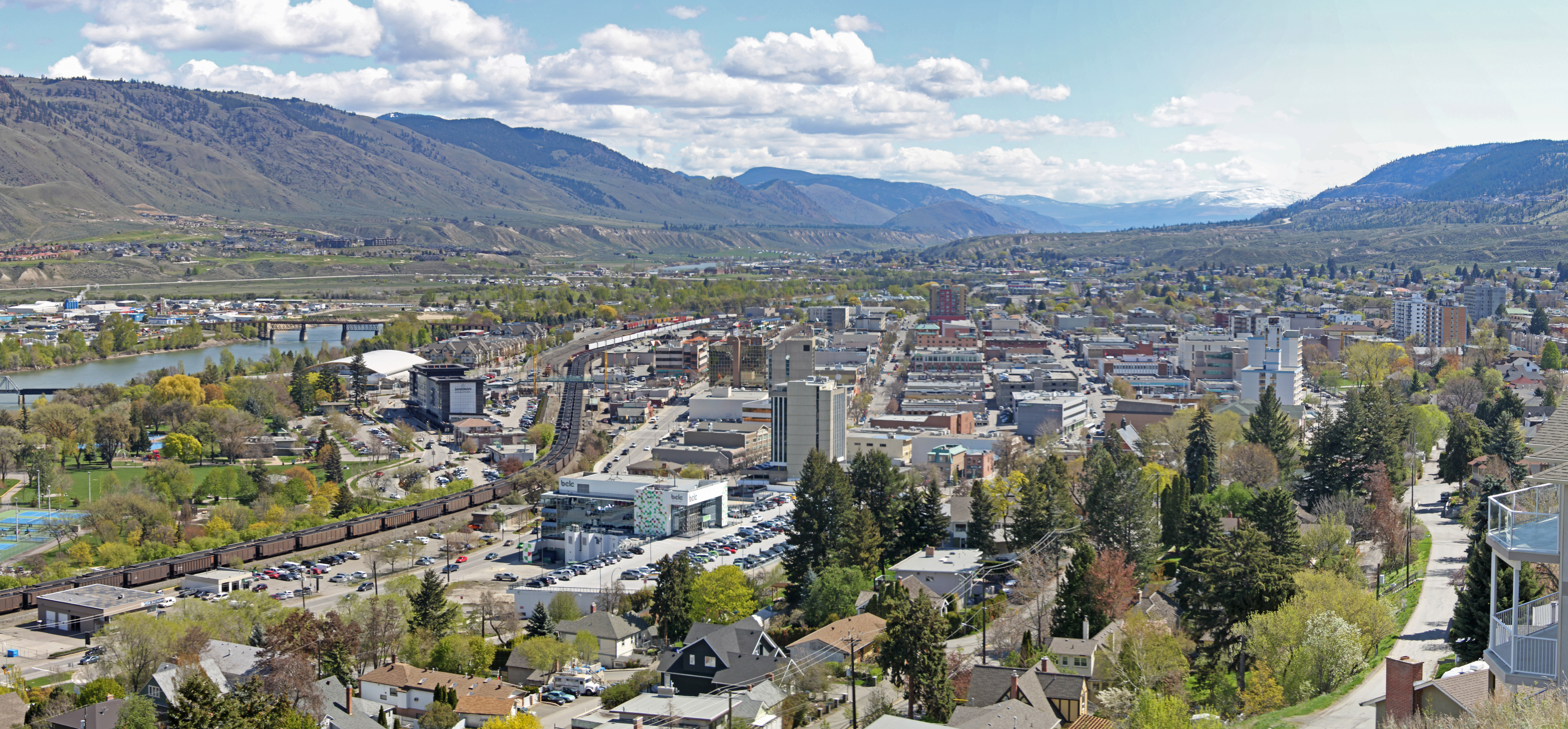 Downtown Kamloops skyline with the Thompson River and surrounding hills