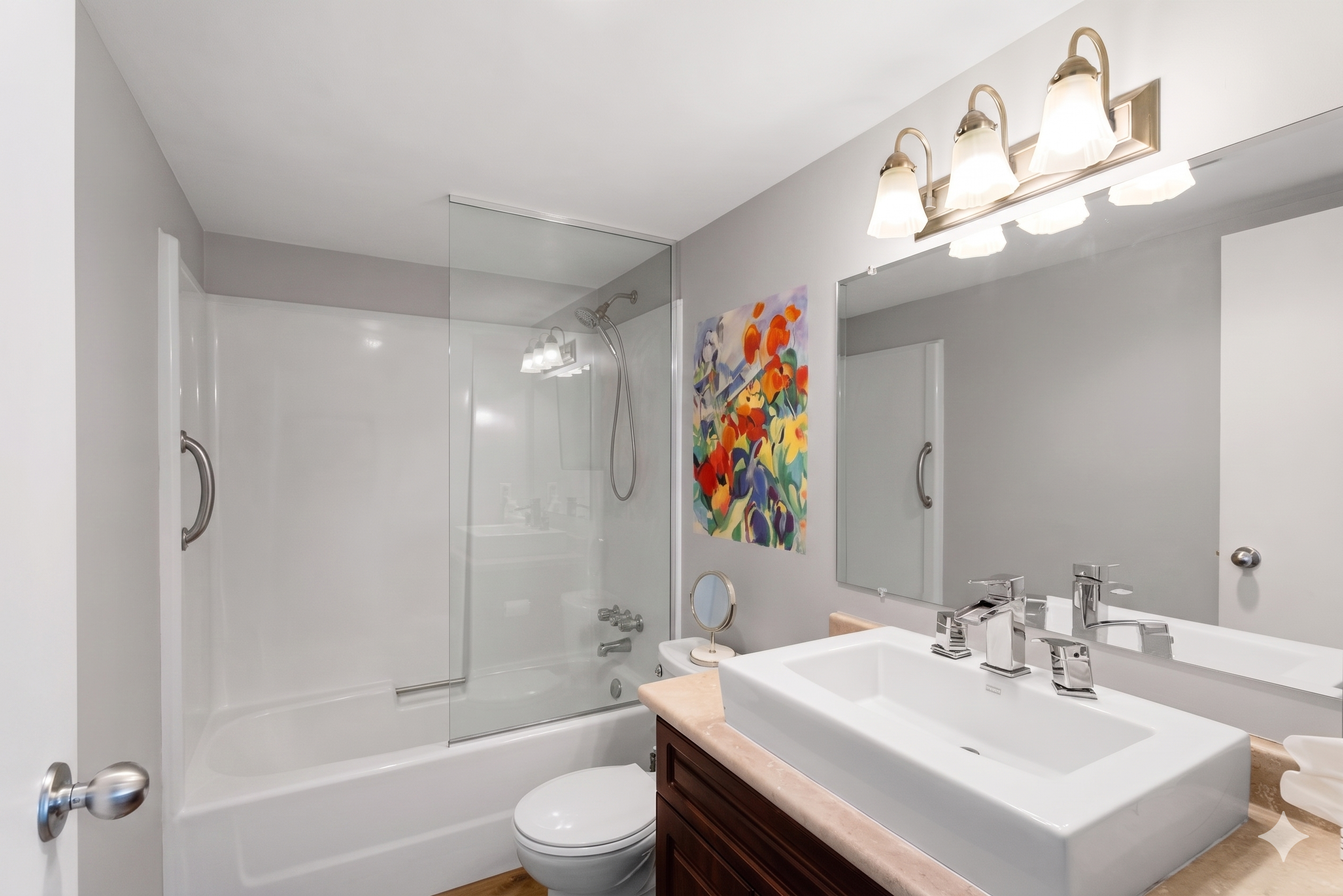 Bathroom with vanity and tub